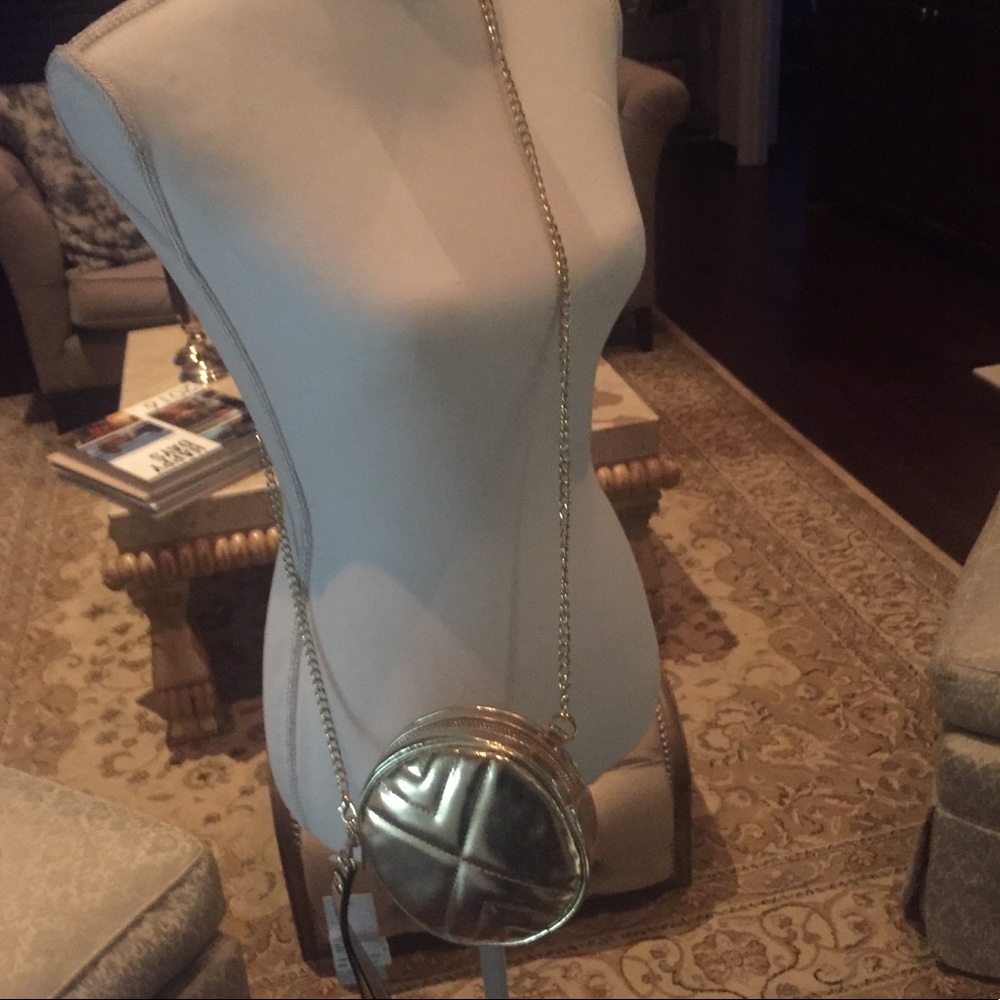 Circular Gold metallic crossbody bad